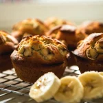 banana oat muffins on cooling rack