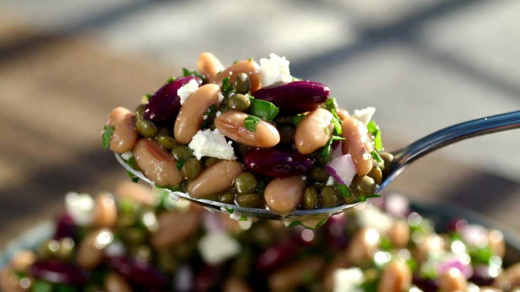 dense bean salad spoon close up